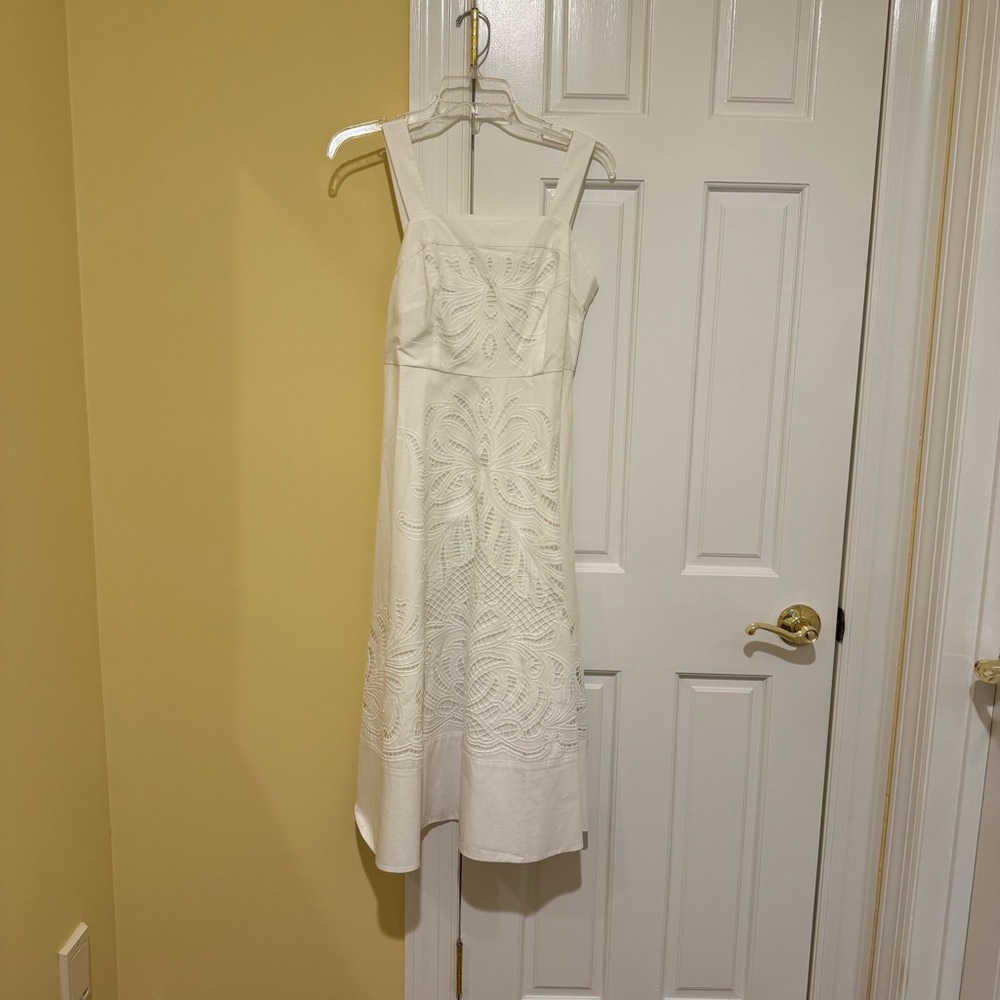 NWT White Sleeveless Dress with Embroidered Design